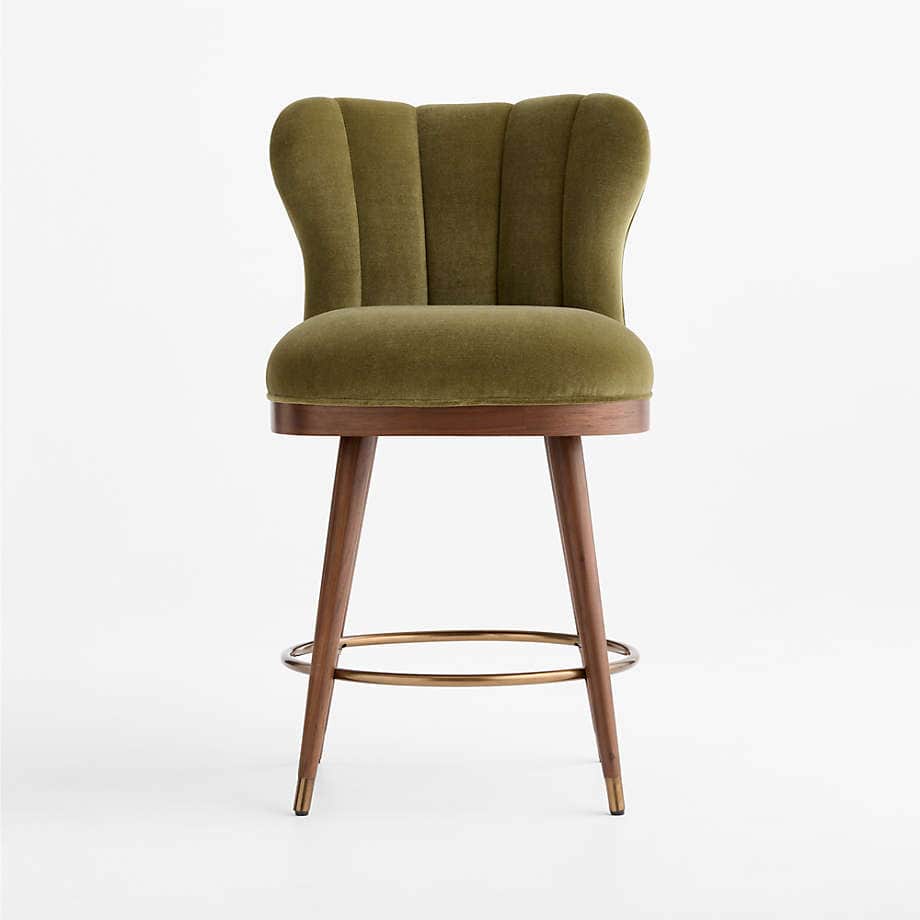 A stylish bar stool featuring an olive green velvet upholstered seat and a distinctive scalloped, ch… — 3D model