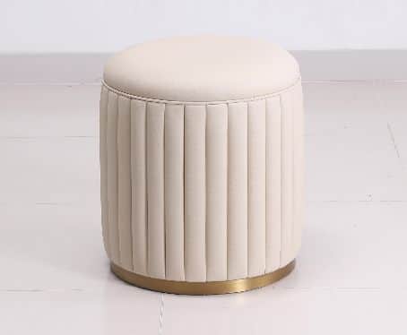 A modern, cylindrical upholstered ottoman featuring vertical fluting around its body and a smoothly… — 3D model