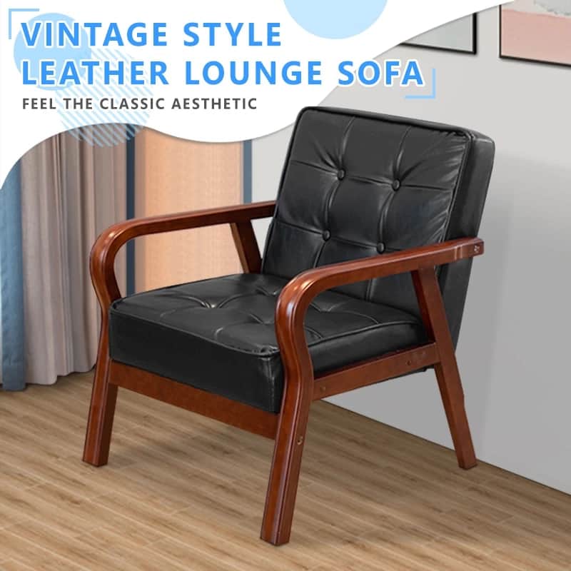 A stylish armchair featuring a prominent dark wooden frame and black upholstered cushions. The back… — 3D model