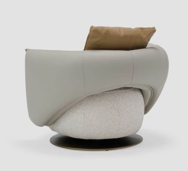 A modern, rounded swivel lounge chair featuring a distinctive two-tone upholstery and a dark metalli… — 3D model