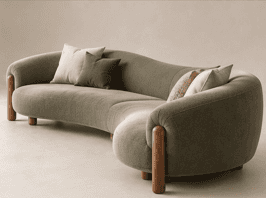 A long, curved sectional sofa with an organic, undulating shape, upholstered in a textured sage gree… — free SKP 3D model