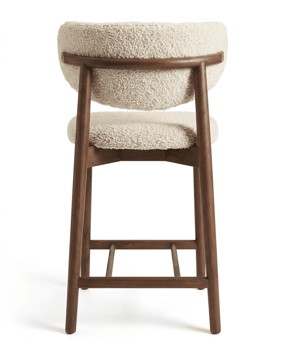 A bar stool with a curved backrest and a separate seat cushion. The frame and legs are made of dark… — free FBX 3D model