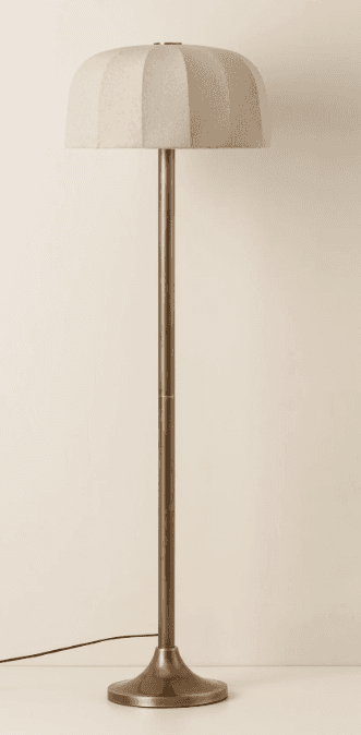 A floor lamp with a cylindrical metal pole and a bell-shaped lampshade. The lampshade has a textured… — 3D model