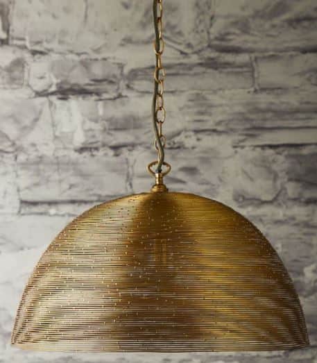 A dome-shaped pendant light featuring a shade constructed from tightly coiled or woven brass-toned m… — 3D model