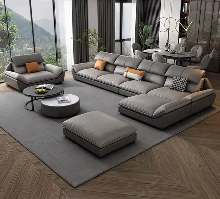 A modern multi-piece seating set featuring a large L-shaped sectional sofa with an integrated chaise… — 3D model