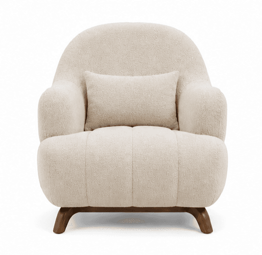 An upholstered armchair featuring a plush, rounded silhouette. The chair is covered in a textured cr… — 3D model