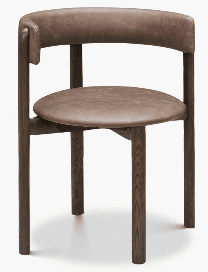 A contemporary armchair featuring a dark-stained solid wood frame and a curved backrest and round se… — 3D model