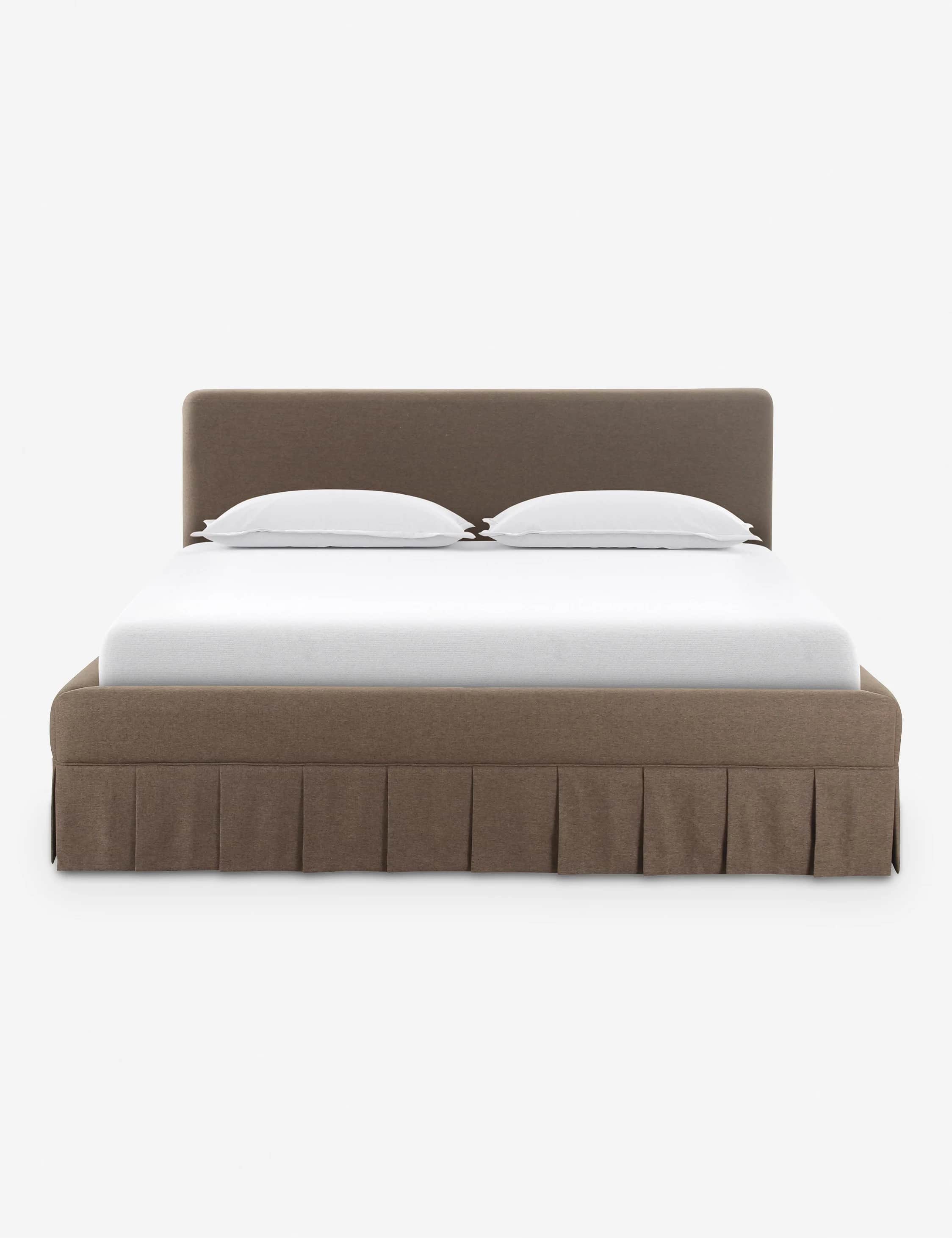 A contemporary upholstered platform bed featuring a soft, rounded headboard and a matching base with… — free STL 3D model