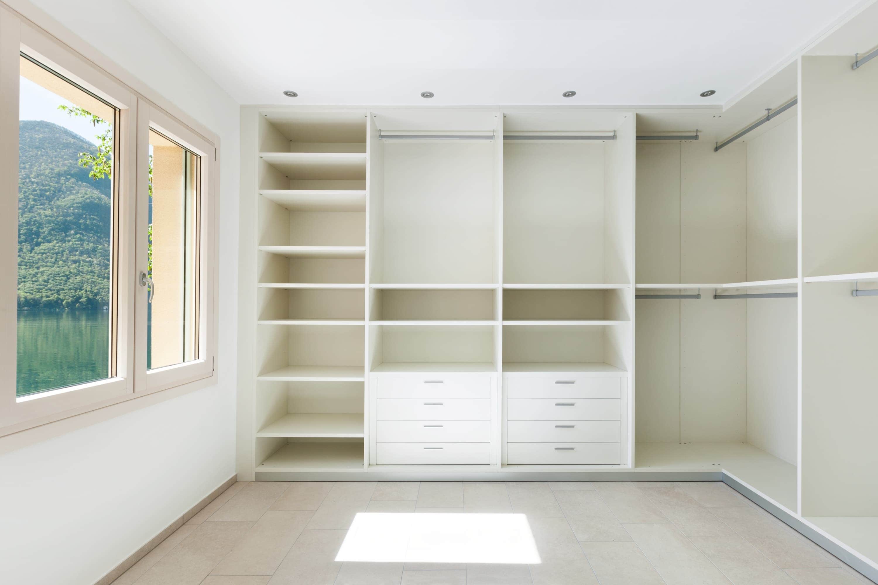 An L-shaped modular open closet system in a clean white finish, featuring a combination of open shel… — 3D model