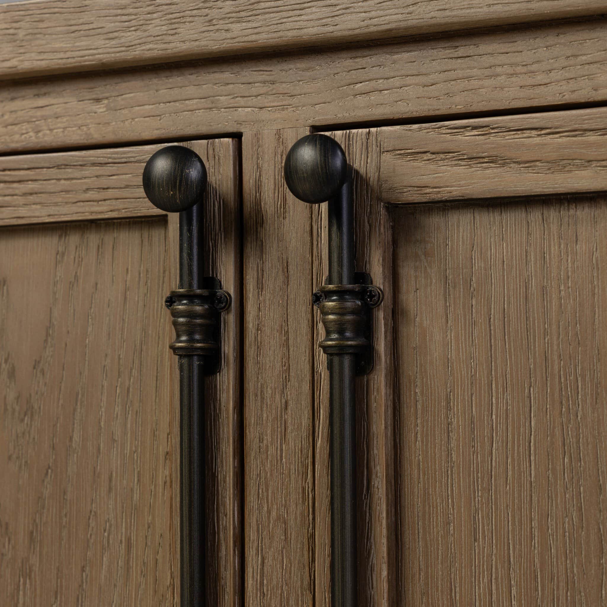 A close-up view of two cabinet doors, constructed from light brown, visibly distressed wood. Each do… — 3D model