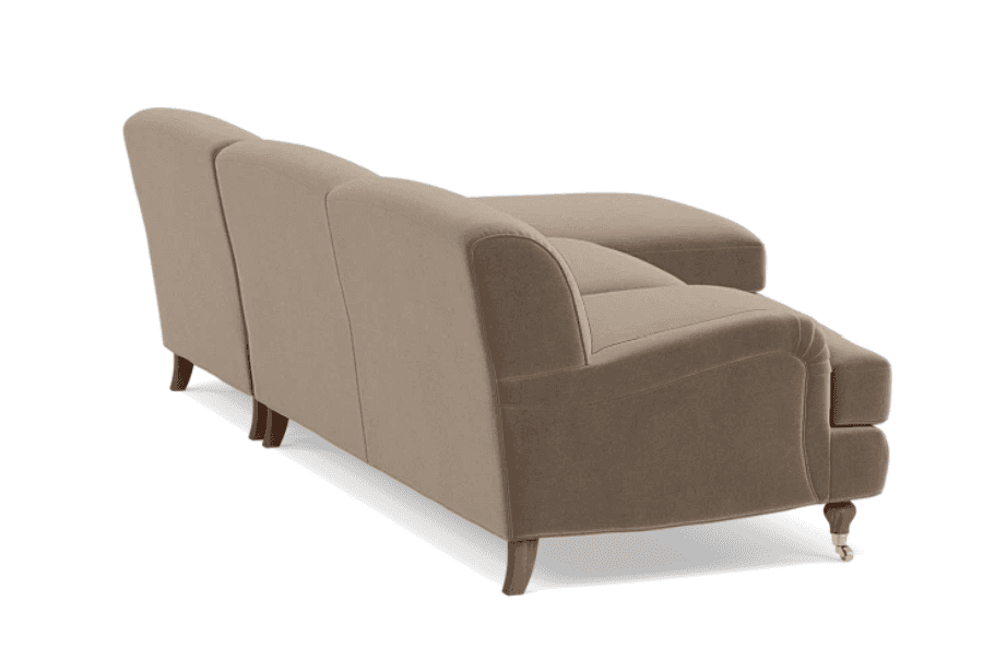 A modern sectional sofa with a chaise extension, upholstered in a light taupe fabric and featuring w… — 3D model