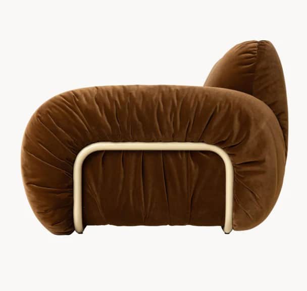 A plush, sculptural armchair upholstered in a rich brown velvet fabric. The armchair features an org… — 3D model