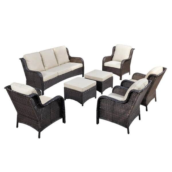 A three-seater outdoor sofa featuring a dark brown synthetic wicker frame and light beige fabric cus… — 3D model