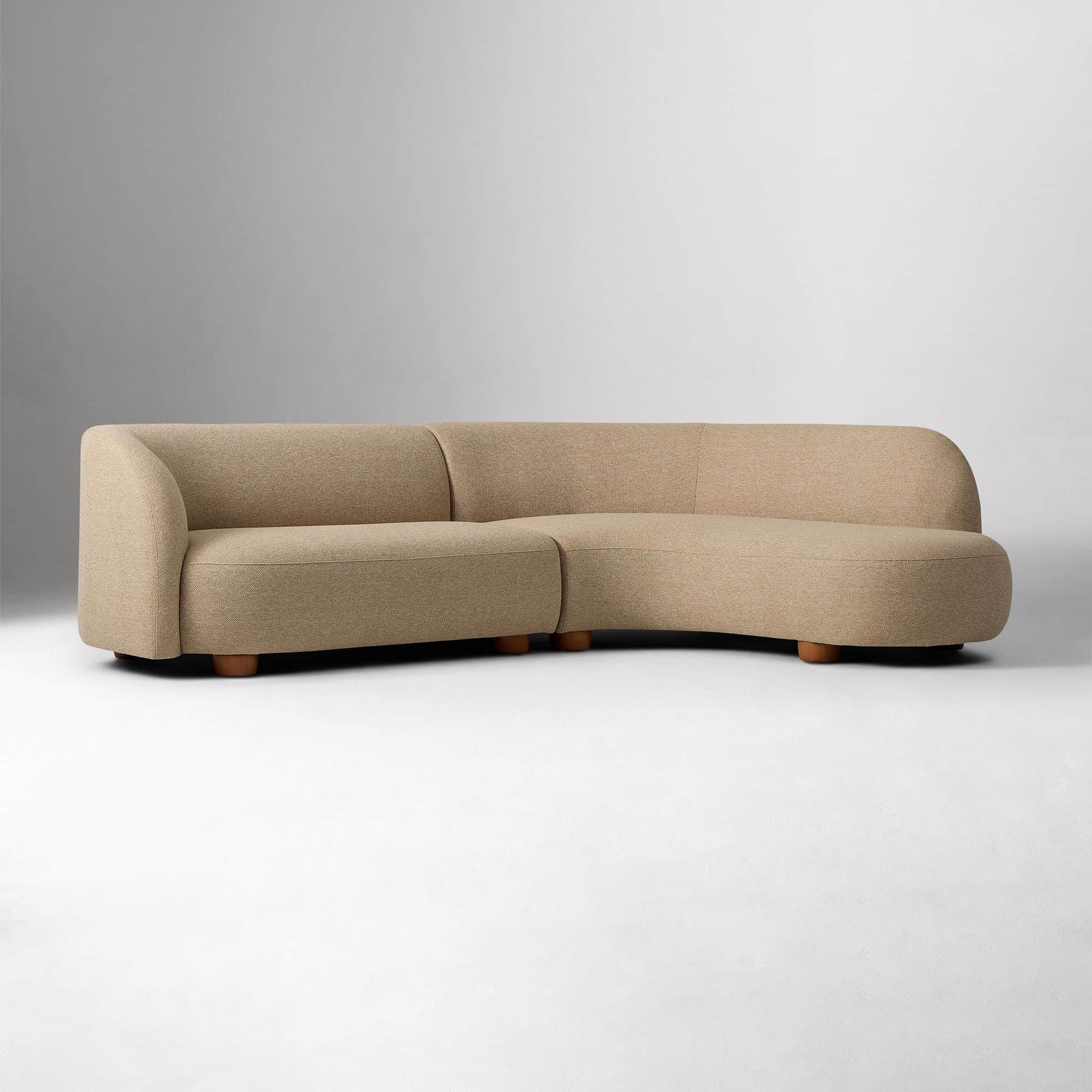 A contemporary curved sectional sofa, upholstered in a textured beige fabric, featuring a two-piece… — 3D model