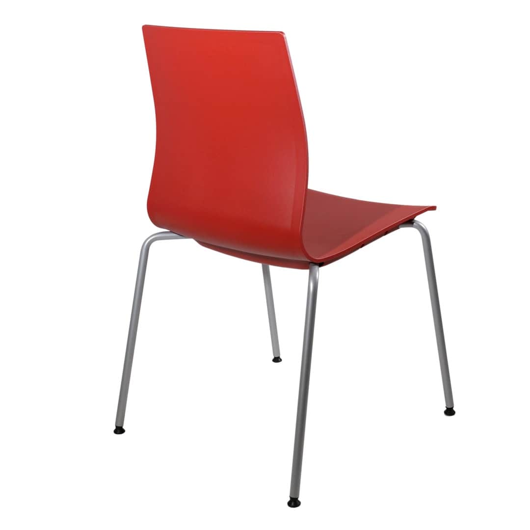 A modern red chair with a single-piece molded seat and backrest, supported by four slender, silver-t… — 3D model