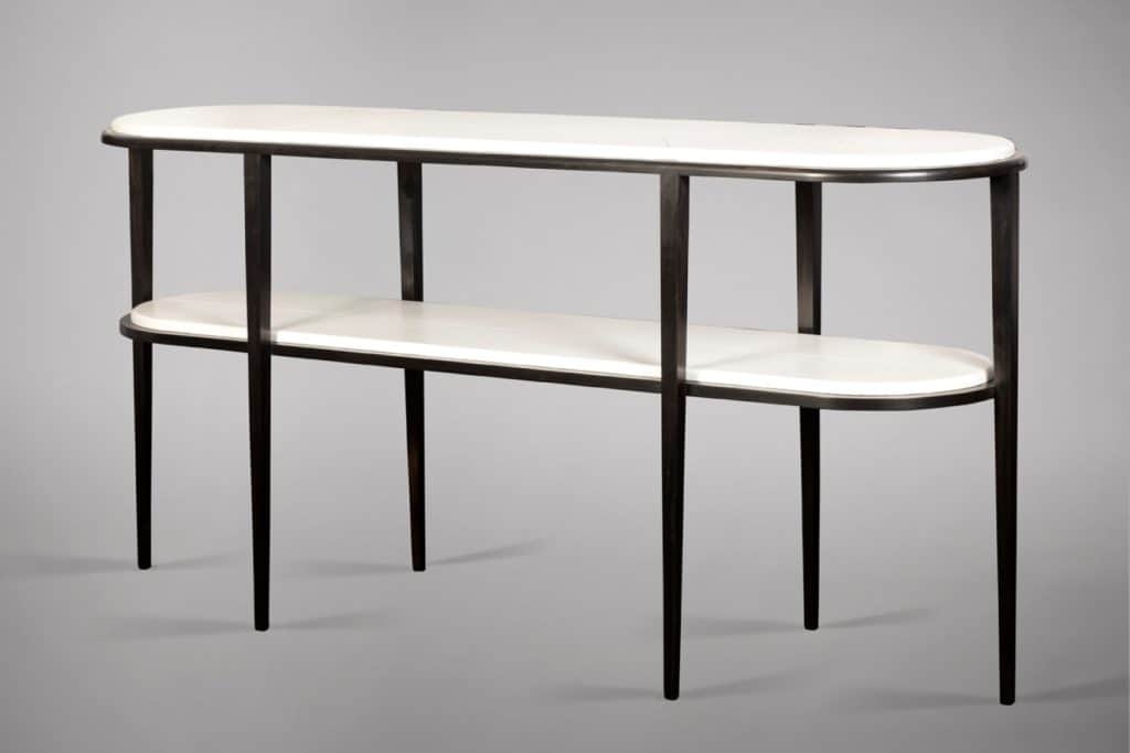 A two-tiered console table featuring two elongated oval white marble tops supported by a dark-finish… — 3D model