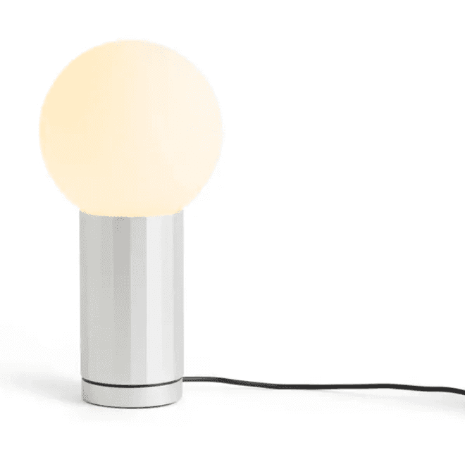 A modern table lamp featuring a spherical, frosted glass diffuser atop a cylindrical base with verti… — 3D model
