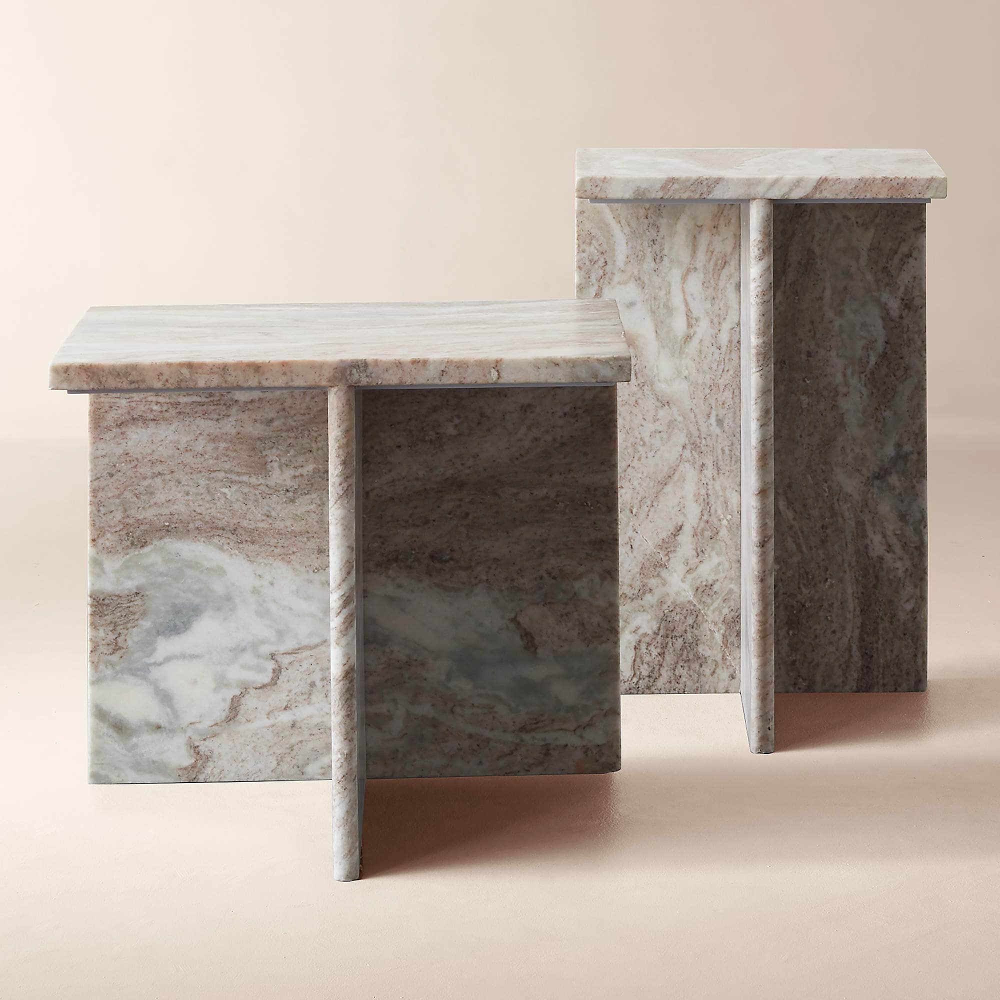 A set of two side tables, each constructed from marble. The tables have a rectangular top and a sing… — 3D model