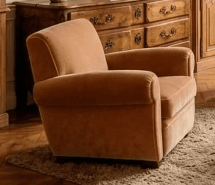 A plush, upholstered single-seater armchair featuring rolled arms and a separate, removable seat cus… — 3D model
