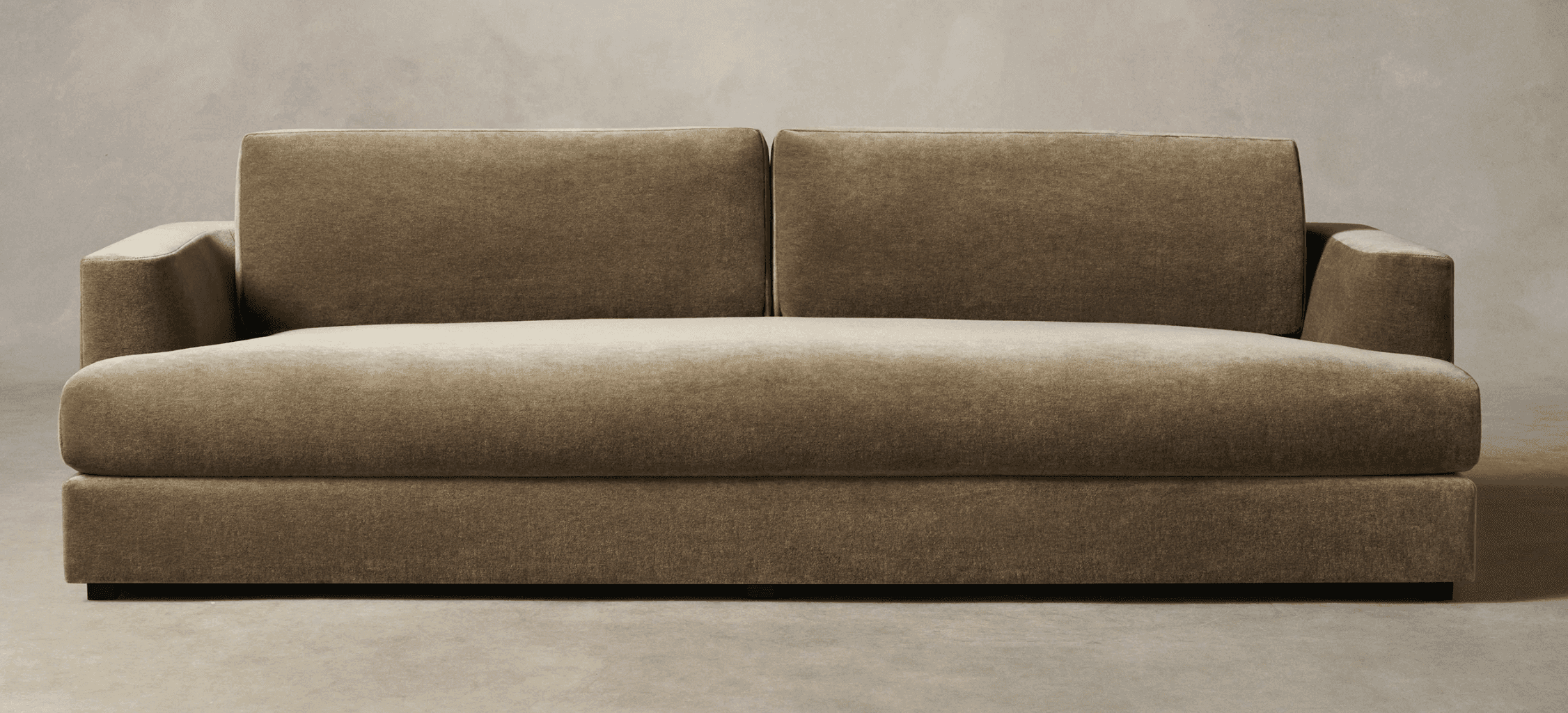A contemporary two-seater sofa upholstered in a plush, olive green velvet or similar fabric, featuri… — 3D model