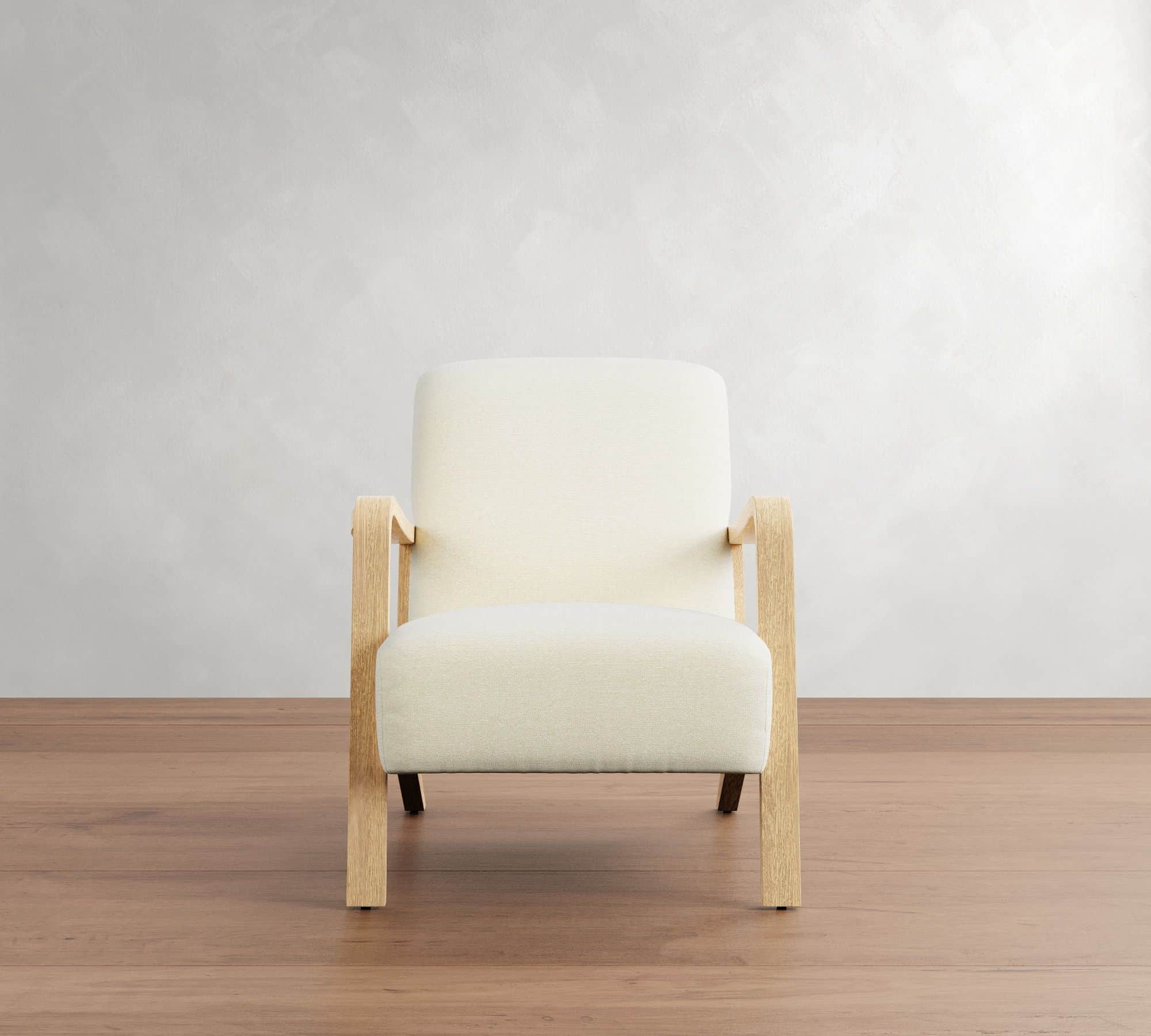 A modern armchair with a light-colored upholstered seat, back, and armrests, supported by a light wo… — 3D model
