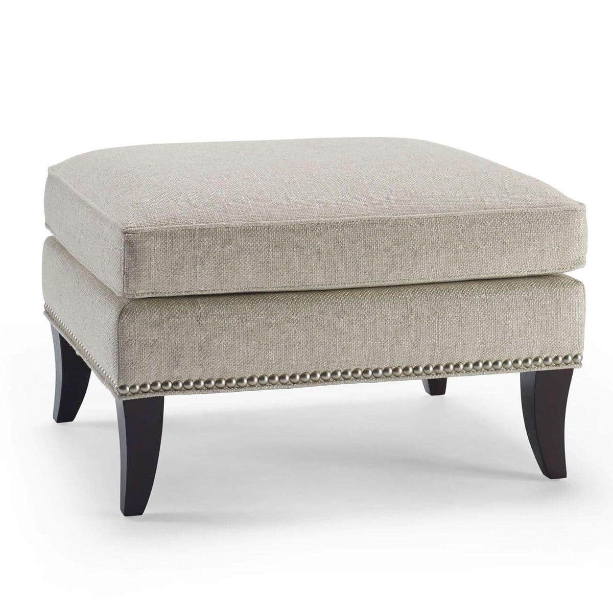 A rectangular upholstered ottoman featuring a light beige, textured fabric. It has a plush, removabl… — 3D model