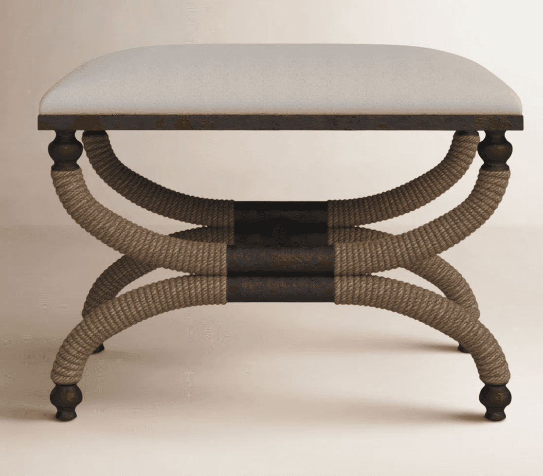 A stool with a cushioned top and a decorative base. The base features four legs made of dark-colored… — 3D model