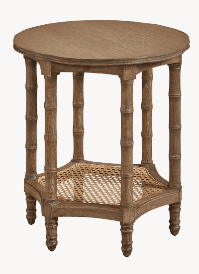 A round-top end table with a distressed wood finish. It features a lower shelf with a cane webbing p… — 3D model