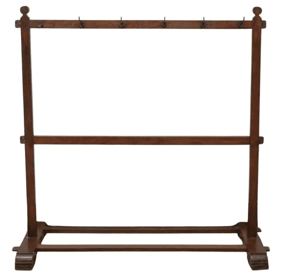A dark-stained wooden freestanding coat rack featuring two vertical posts topped with decorative fin… — 3D model