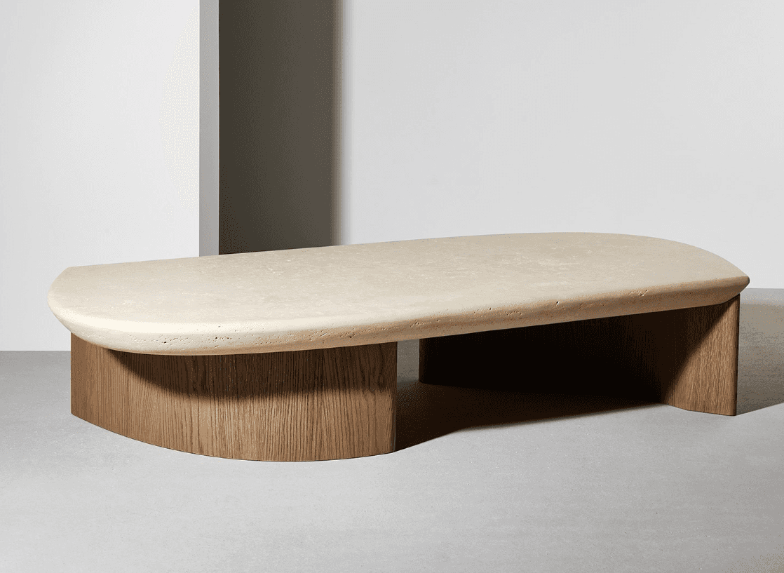 A contemporary coffee table featuring a thick, rounded, irregular-shaped top and a contrasting base.… — free BLEND 3D model