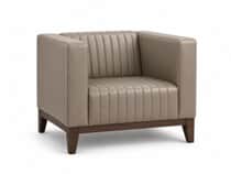 A modern club armchair featuring a boxy silhouette, upholstered in a beige or taupe material with di… — 3D model