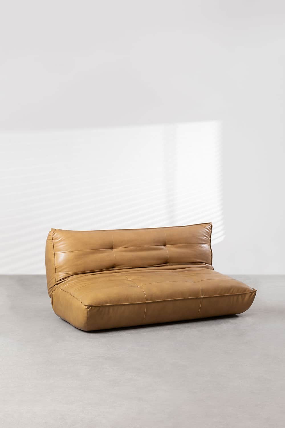A low-profile, tufted sofa with a contemporary design. It features a single-piece seat and backrest… — 3D model