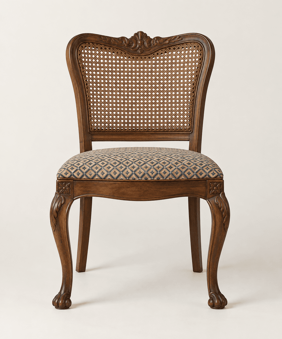 A traditional dining chair with a dark wood frame, featuring a woven cane backrest and an upholstere… — 3D model