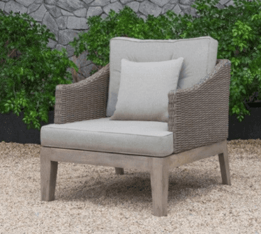 A contemporary outdoor armchair featuring a sturdy wooden frame and tightly woven synthetic rattan a… — 3D model
