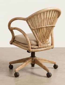 A desk chair constructed with a natural woven rattan frame for the backrest and armrests. The seat i… — free BLEND 3D model