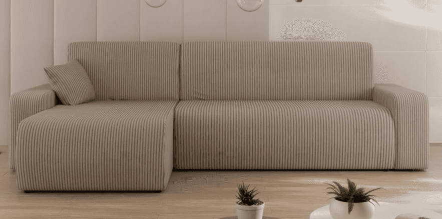 A modular sectional sofa with a chaise lounge extension. The sofa features a ribbed upholstery textu… — 3D model
