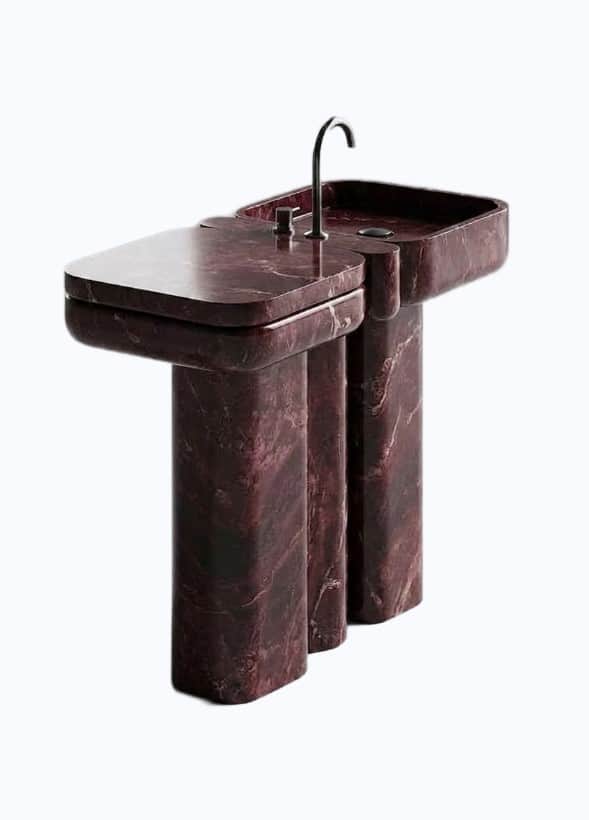 A contemporary bathroom vanity crafted from dark reddish-purple marble, featuring an integrated rect… — 3D model