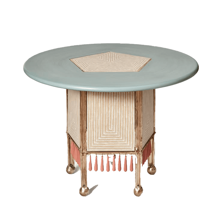 A decorative round accent table featuring a pale blue-green top with a central pentagonal geometric… — 3D model