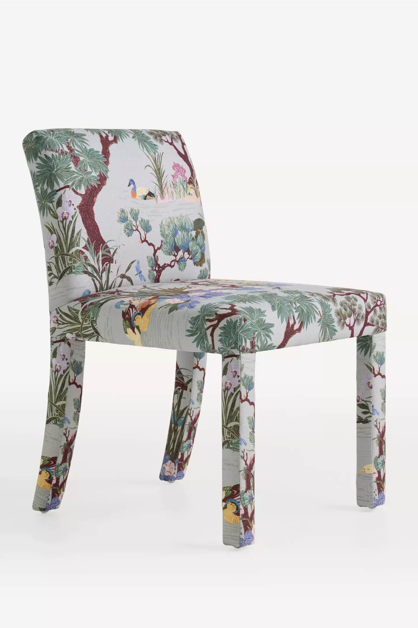 The image displays a fully upholstered armless side chair, presented against a plain white backgroun… — 3D model