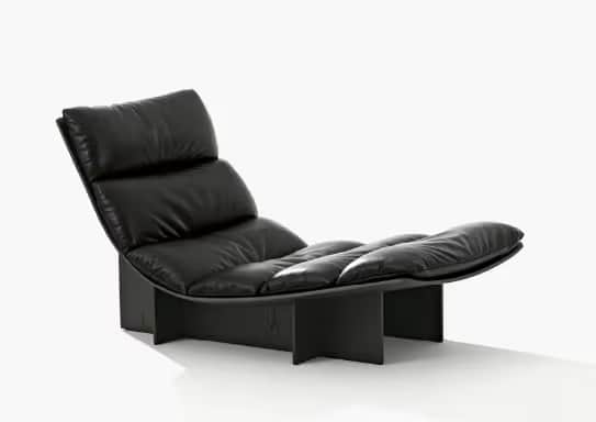 A modern chaise lounge featuring multiple sections of plush, black leather cushioning atop a minimal… — 3D model