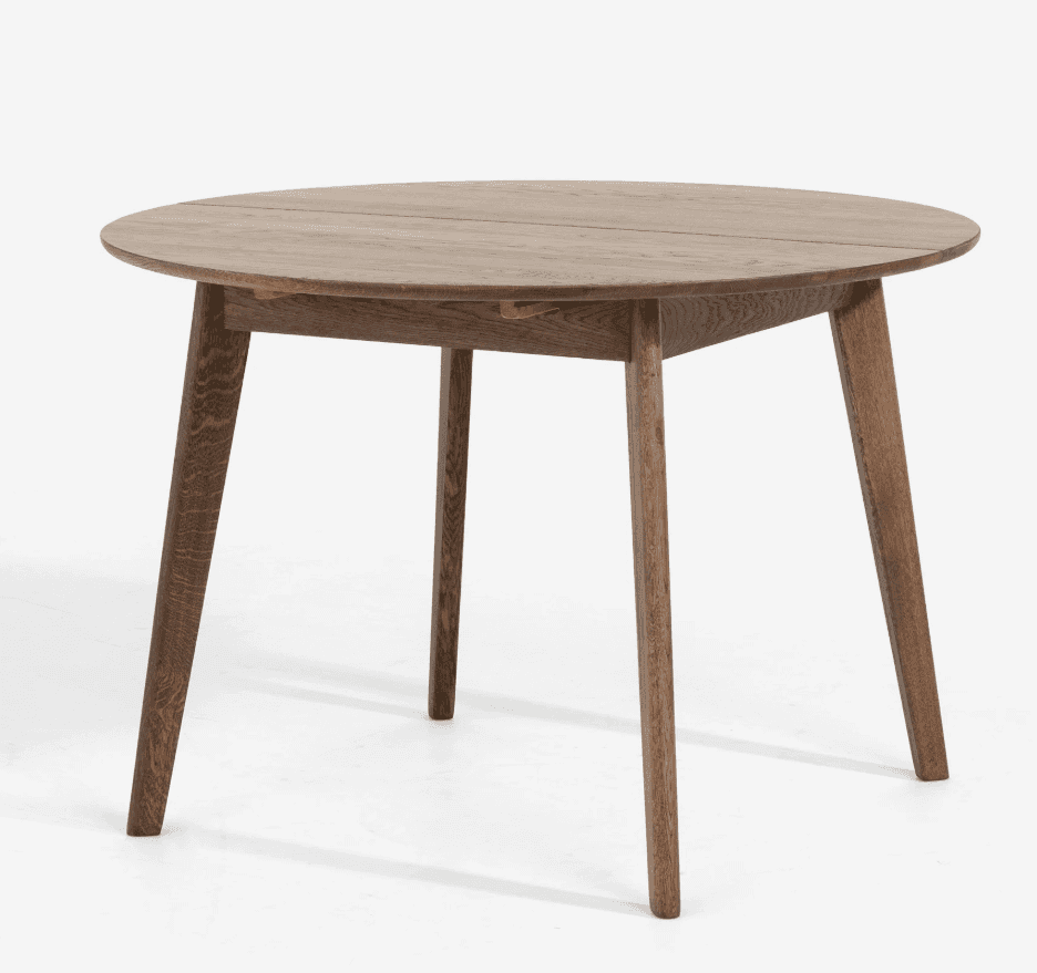 A round dining table with a natural wood finish. It features a split tabletop and four tapered legs.… — free BLEND 3D model