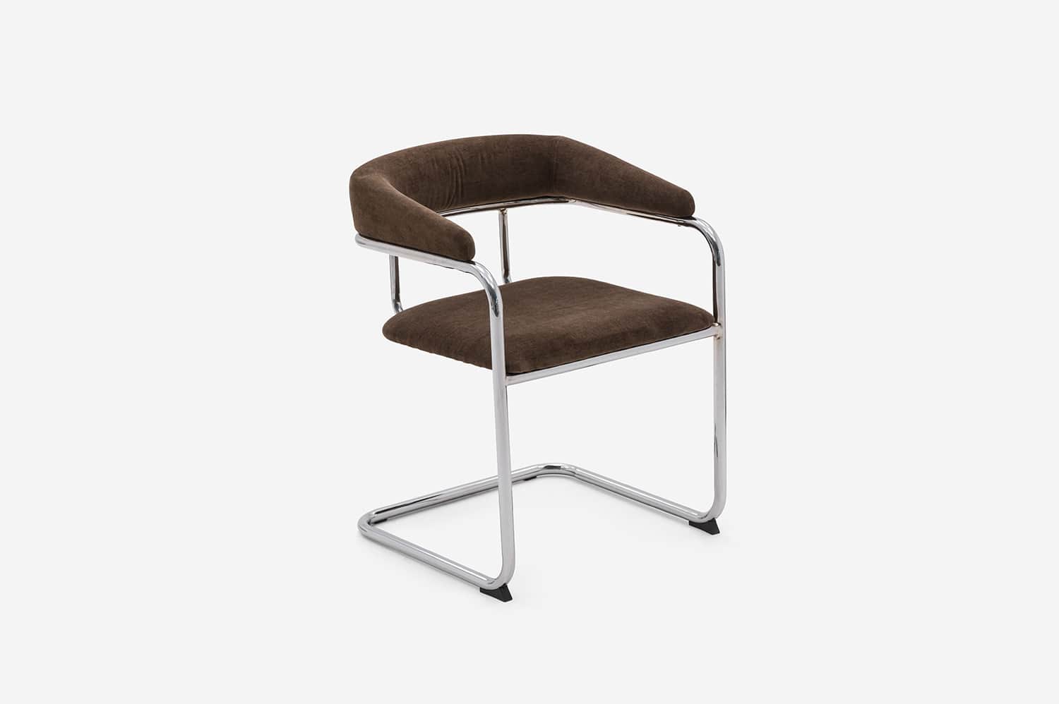 A modern armchair featuring a cantilevered tubular chrome frame and dark brown fabric upholstery. Th… — 3D model