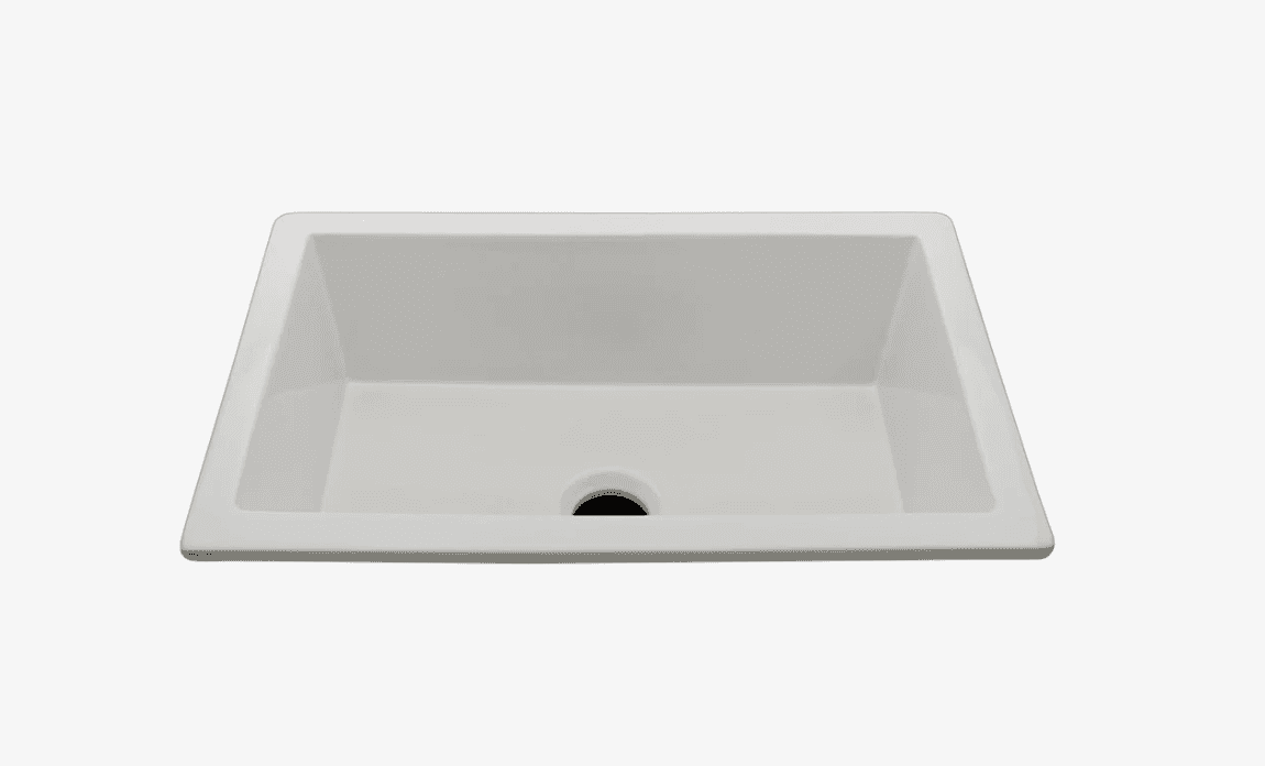 A white, rectangular sink with gently sloped sides and a central drain hole. The sink appears to be… — 3D model