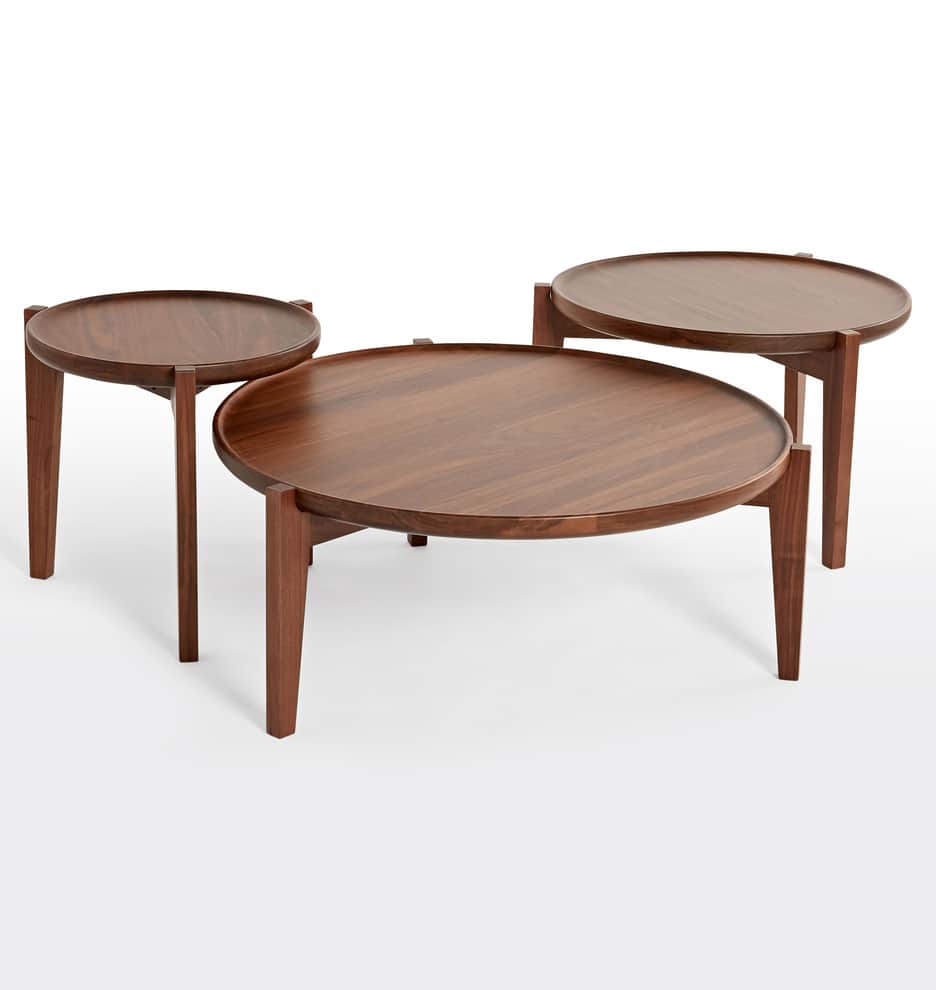 A round, dark wooden coffee table featuring a distinctive tray-like top with a raised edge. The tabl… — 3D model