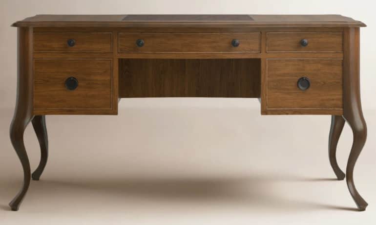 A wooden desk with a rectangular top and five drawers. The desk features curved legs, indicative of… — 3D model