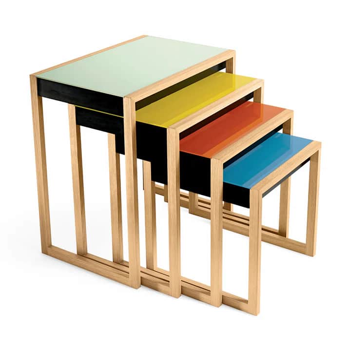 A set of four nesting tables, each with a different colored lacquered top. The frames are made of li… — free OBJ 3D model