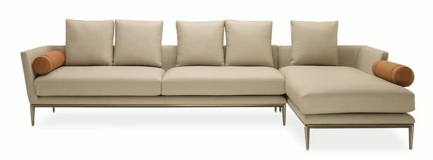 A modern L-shaped sectional sofa featuring a chaise lounge on the right, upholstered in smooth beige… — 3D model