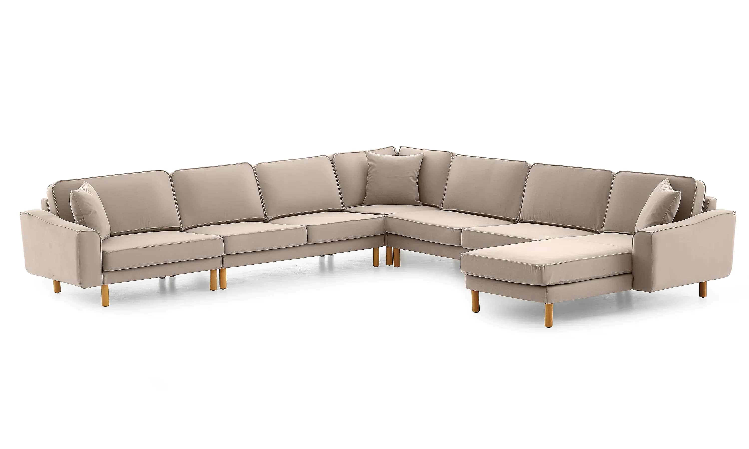 A modern L-shaped sectional sofa upholstered in a light beige or taupe fabric, featuring a right-han… — 3D model