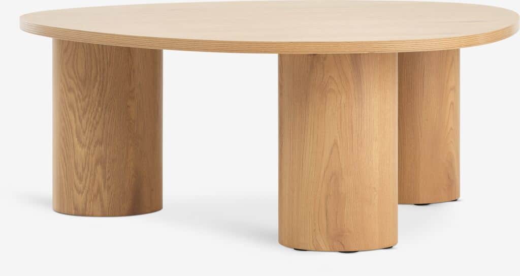 A modern coffee table featuring a rounded, possibly oval or kidney-shaped, top made of light-colored… — 3D model