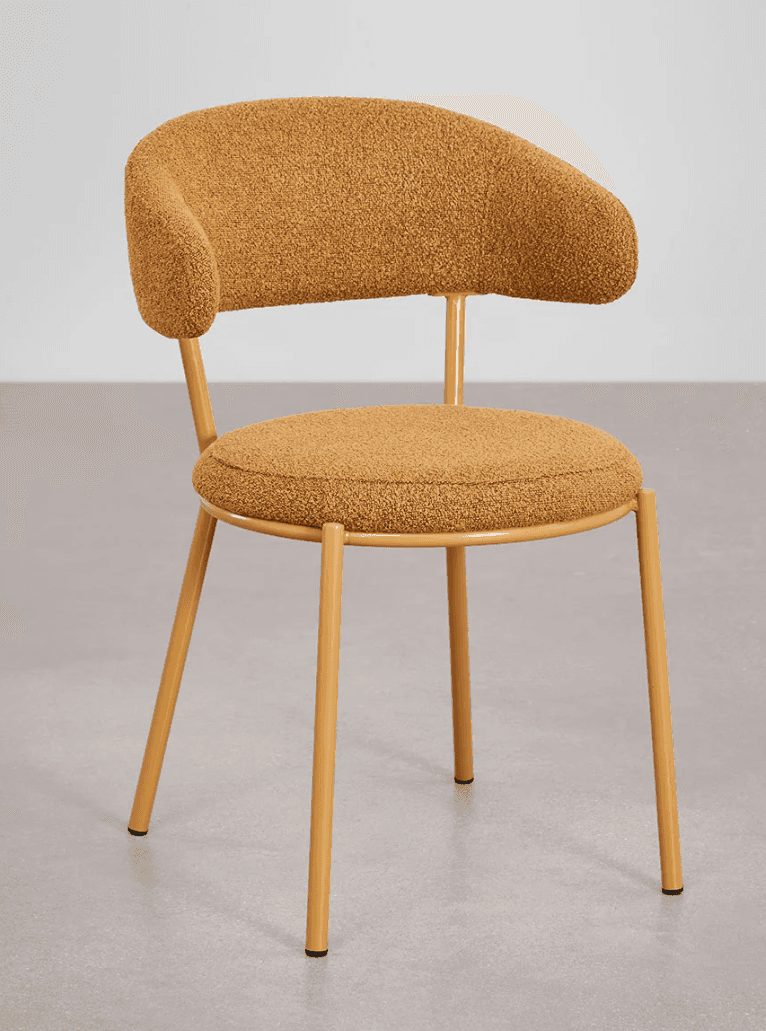 A modern accent chair with a rounded backrest that extends into armrests. The seat and backrest are… — 3D model